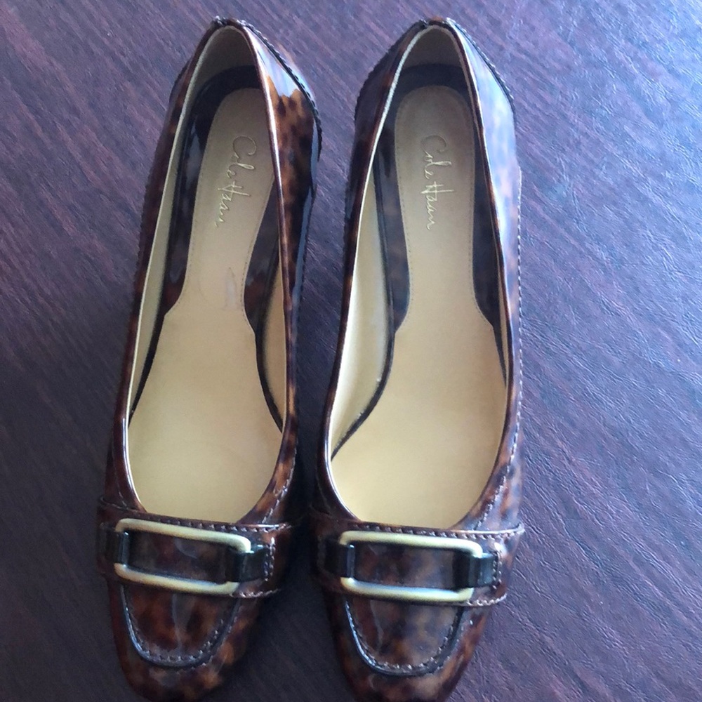 Cole Haan pumps .